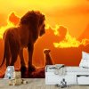 Simba i Mufasa pod zlatnim suncem